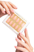 Glam Haus Beauty press-on nails packaging with gold accents on a white background, pink nails color, almond shaped nails 
