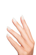 hand wearing white nails. nail color white. nail shape short oval