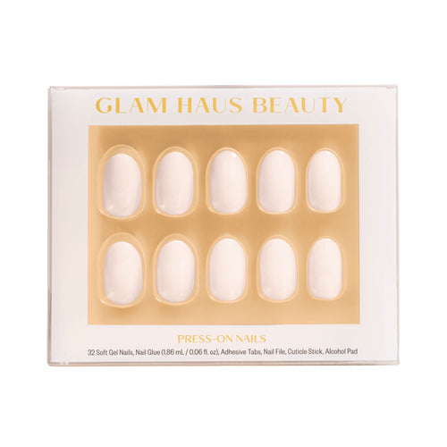 Glam Haus Beauty press-on nails, white color, short oval shaped nails with Glam Haus Beauty packaging with gold and white design.