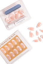 Glam Haus Beauty nails kit with chrome French tip press-on nails and a nail file on a white background