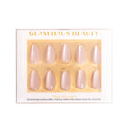 Glam Haus Beauty press-on nails packaging with gold accents on a white background, chrome pink nails color, almond shaped nails 
